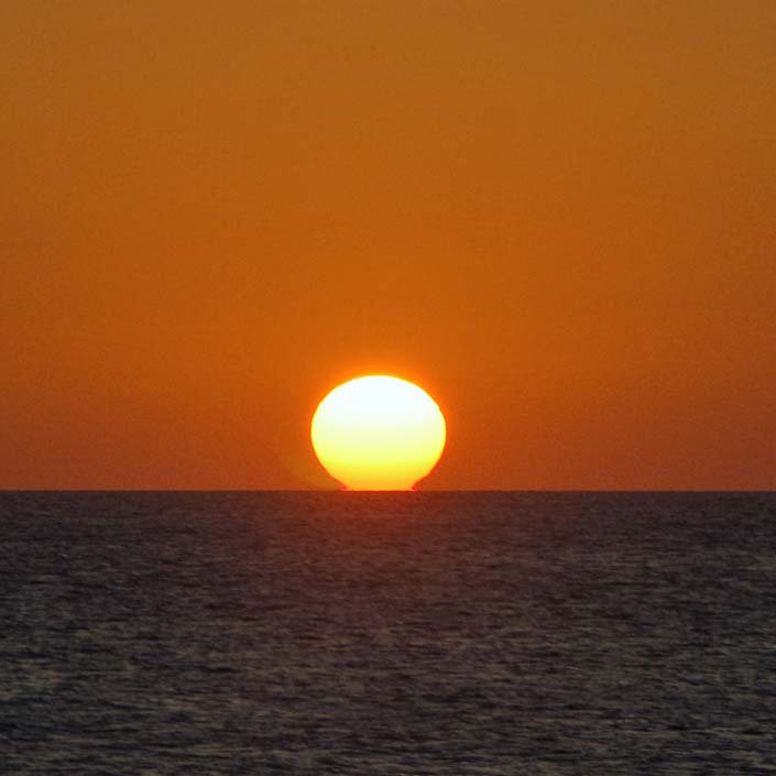 Capitán de Yate. Puesta de sol en Oceano Atlántico